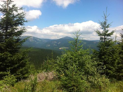 a view of the mountains from the top of a hill at Chalupa Mates Černý důl in Cerny Dul