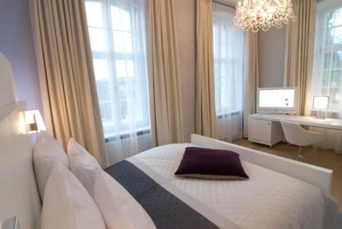 Ein Bett oder Betten in einem Zimmer der Unterkunft Hotel Ketschauer Hof