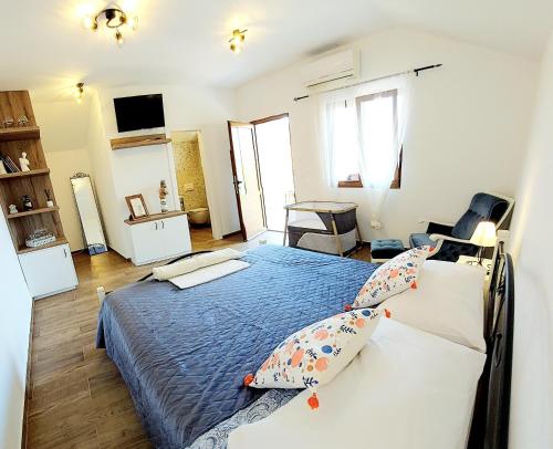 a bedroom with two beds in a room at Hacienda Murter in Murter