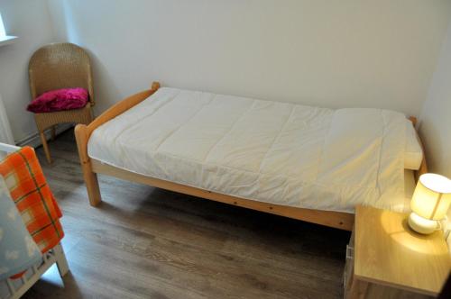 Postel nebo postele na pokoji v ubytování 'T Bakhuusje