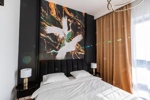 Posteľ alebo postele v izbe v ubytovaní Apartament Plaza Tower 14 Piętro