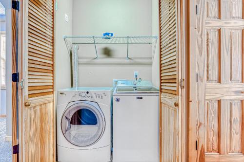 a washer and dryer sitting in a room at Second Chair Inn in Rhododendron