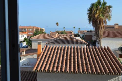 a view of a tile roof of a building at Irene Beach Málaga, Parking Gratuito in Cala del Moral