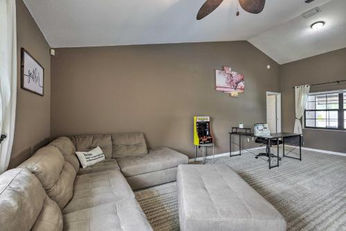 a living room with a couch and a table at Ocala Escape with Private Pool, Pets Welcome! in Marion Oaks