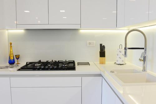 Η κουζίνα ή μικρή κουζίνα στο Apartman Milena