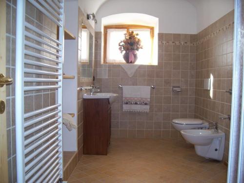 Ванная комната в Casa Iride