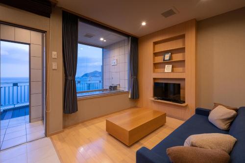 Posezení v ubytování Auberge Fontaine Bleau Atami