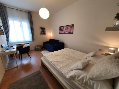 Posteľ alebo postele v izbe v ubytovaní BöSIX Apartman