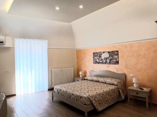 Casa del Monte tesisinde bir odada yatak veya yataklar
