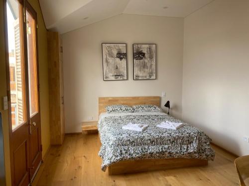 Ένα ή περισσότερα κρεβάτια σε δωμάτιο στο RIALTO SUITES Fremantle