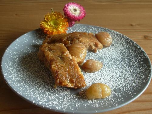 a plate with some food on a table at Rifugio Galaberna in Ostana