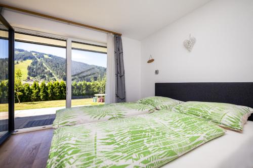 Posteľ alebo postele v izbe v ubytovaní Fischis Alpen Appartements