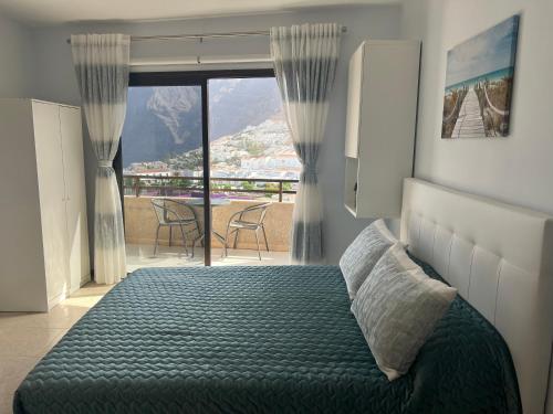 Posteľ alebo postele v izbe v ubytovaní Studio with fantastic sea view in Los Gigantes