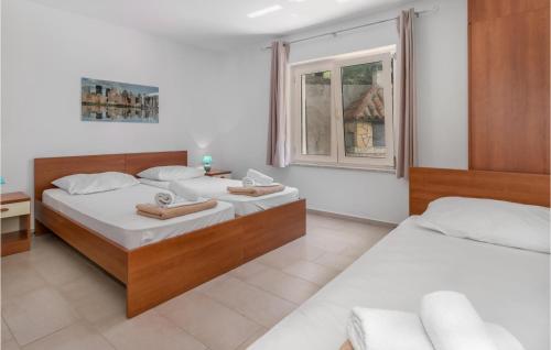 Ένα ή περισσότερα κρεβάτια σε δωμάτιο στο Awesome Apartment In Grizane With Wifi