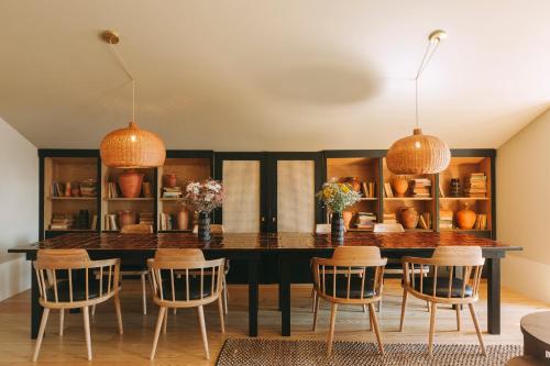 a dining room with a table and chairs at Village Aparthotel By BOA in Porto