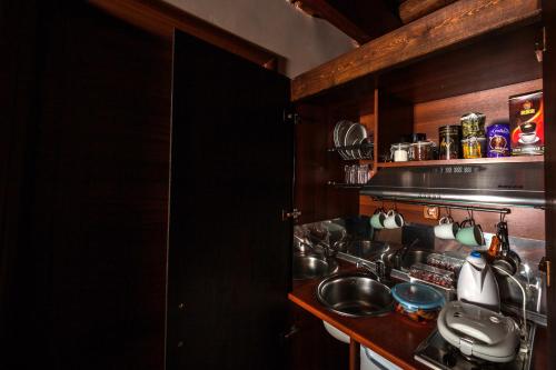 a kitchen with a sink and a counter top at Pera Alonia Guest House in Kato Trikala Korinthias