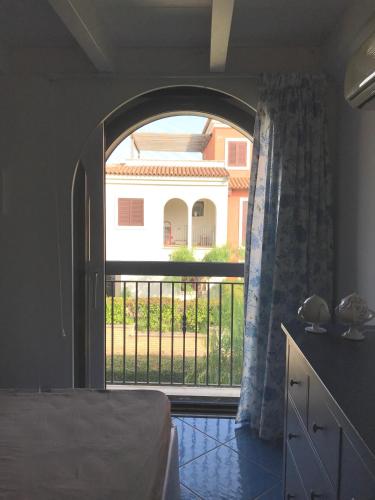 Ένα ή περισσότερα κρεβάτια σε δωμάτιο στο Tartaruga House