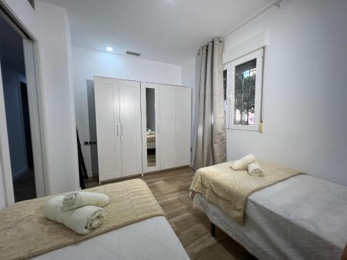 Posteľ alebo postele v izbe v ubytovaní Camaretas sweet dreams acogedor piso junto al mar