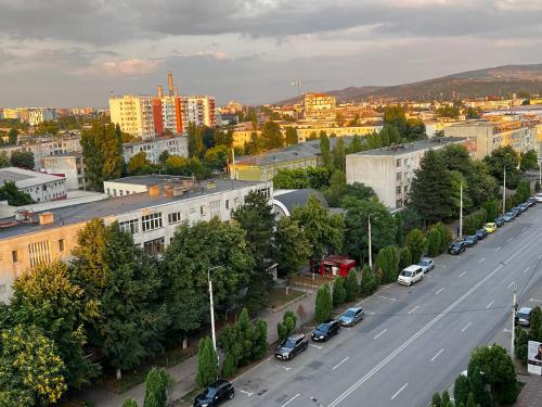 an aerial view of a city with cars parked on a street at Central Palace Suites with Parking in Iaşi
