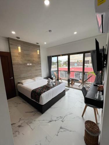 Postel nebo postele na pokoji v ubytování Hotel Ko'ox Wenne