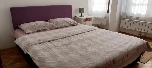 Apartment Splitska tesisinde bir odada yatak veya yataklar