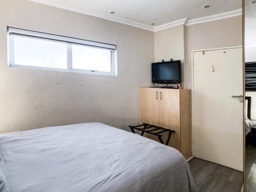 Katil atau katil-katil dalam bilik di Splice Apartments