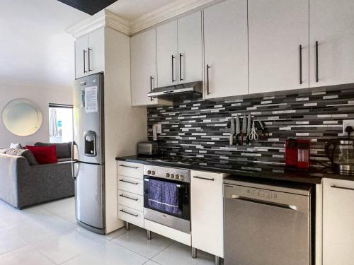 Dapur atau dapur kecil di Splice Apartments