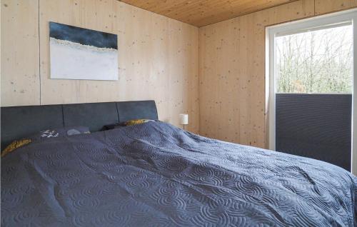 Llit o llits en una habitació de Ferienhaus 3 Wolfschlucht
