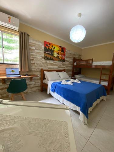 Postel nebo postele na pokoji v ubytování Refúgio Pousada Fortaleza
