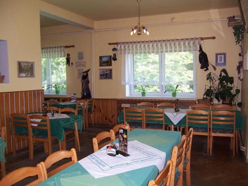 Um restaurante ou outro lugar para comer em Penzion Čertovy Kameny