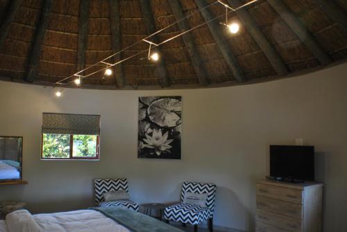 Katil atau katil-katil dalam bilik di Roundhouse Guesthouse