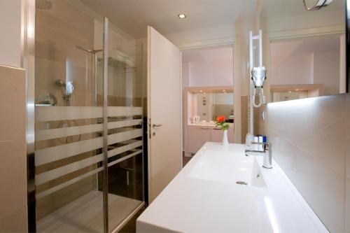 Ein Badezimmer in der Unterkunft Laguna Palace Hotel Grado