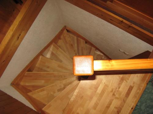 an overhead view of a wooden floor with a light on it at Počitniška hiša Ukanc in Bohinj