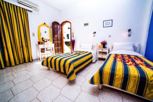 Postel nebo postele na pokoji v ubytování Creta Mar-Gio