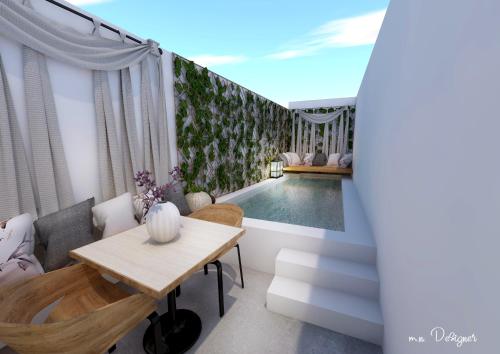 visualización de una sala de estar con piscina en Atlantis Boutique City Hotel, en Rodas
