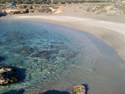 an aerial view of a beach and the ocean at Coral Front Beach in Káto Zákros