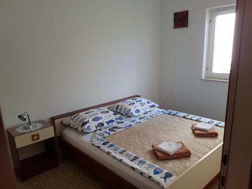 Posteľ alebo postele v izbe v ubytovaní Apartmani LuMa / apartman Luka