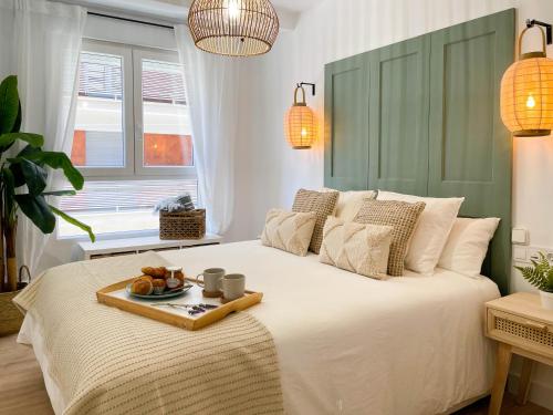 Postel nebo postele na pokoji v ubytování Mediterranean Vibes. Oasis de relax en Alicante.
