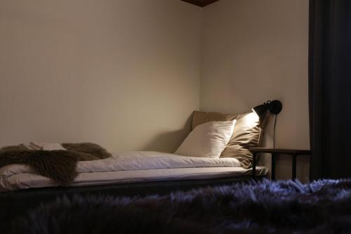 Säng eller sängar i ett rum på Hemavans Wärdshus