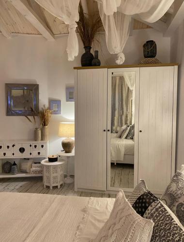 Postel nebo postele na pokoji v ubytování Linari Bohemian Living