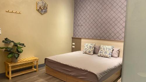 Cama o camas de una habitación en 鄉間小路 Home 備有專屬停車場