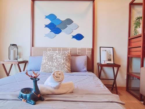 Postel nebo postele na pokoji v ubytování PUTEH Timurbay Beachfront Private SEA view Suite Kuantan