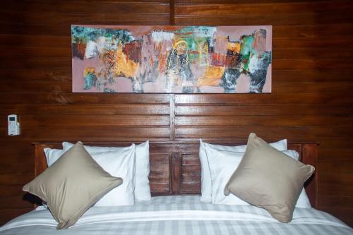 Katil atau katil-katil dalam bilik di Kurnia Guest House & Spa