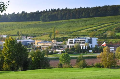 a town in the middle of a green field at Heitlinger Hof in Tiefenbach