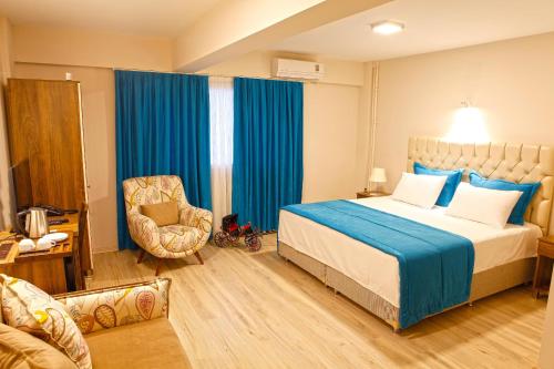 Ένα ή περισσότερα κρεβάτια σε δωμάτιο στο Fayton Hotel
