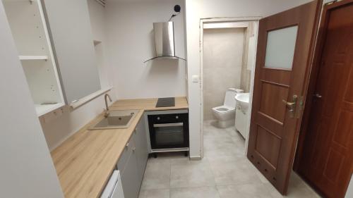 Koupelna v ubytování Pokoje 2-osobowe z prywatną łazienką i kuchnią