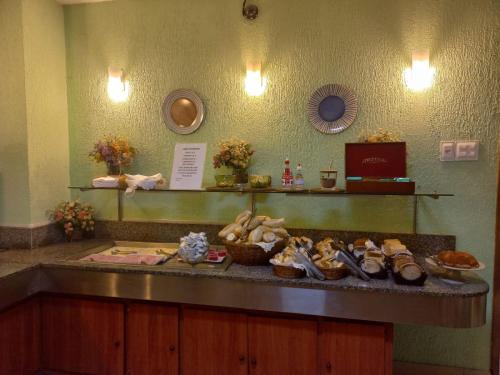 a counter with shoes and other items on it at Itajubá Hotel in Rio de Janeiro