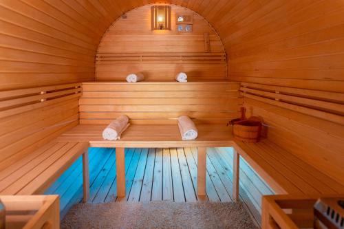 an inside of a sauna with a bench in it at Willa pod Czantorią SPA Ustroń in Ustroń
