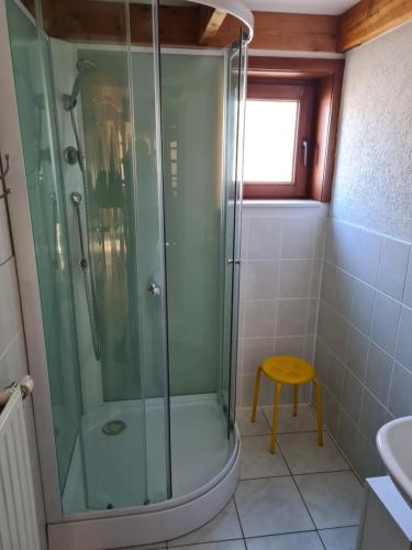 a bathroom with a shower and a sink at Griad in de Duinen in De Haan