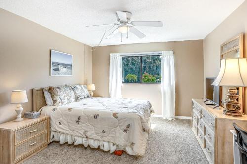 a bedroom with a bed and a window at Casa Bella Paradise in Fort Myers